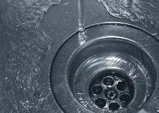 water running into drain hole